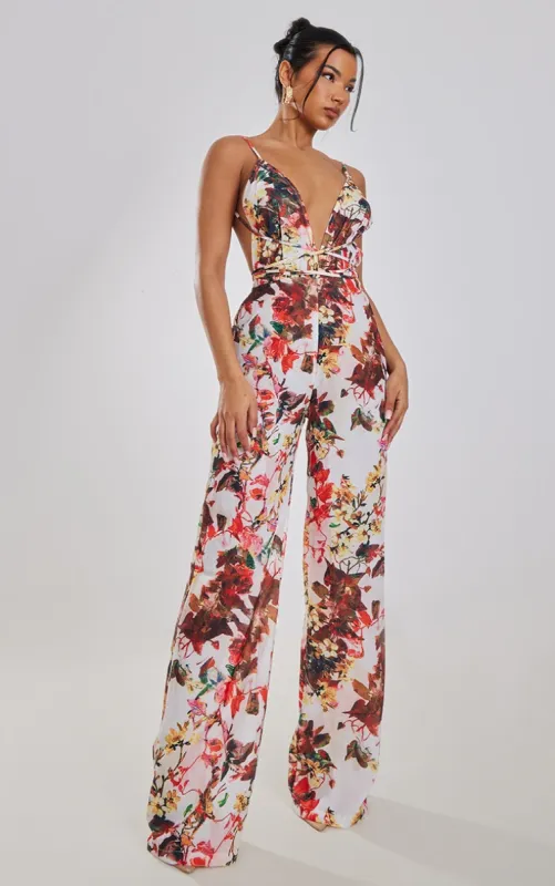 Multi Floral Print Halterneck Wide Leg Jumpsuit sold by Pretty Little Thing