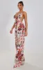 Multi Floral Print Halterneck Wide Leg Jumpsuit sold by Pretty Little Thing