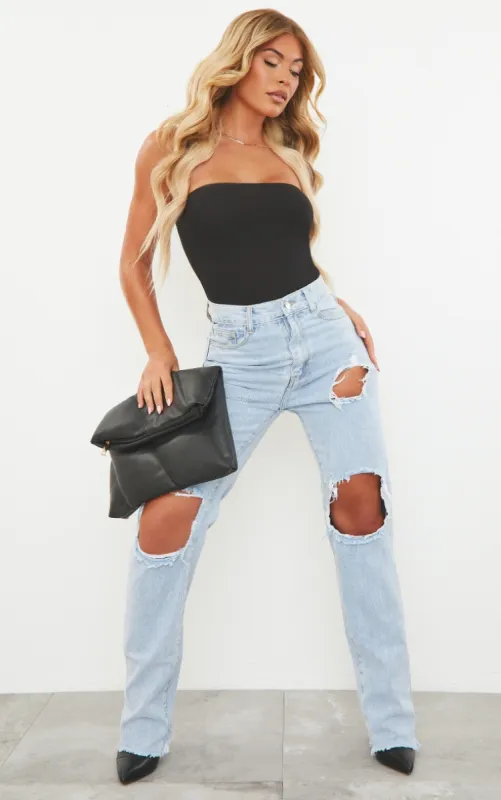 Light Blue Wash Ripped High Waist Straight Leg Jeans sold by Pretty Little Thing