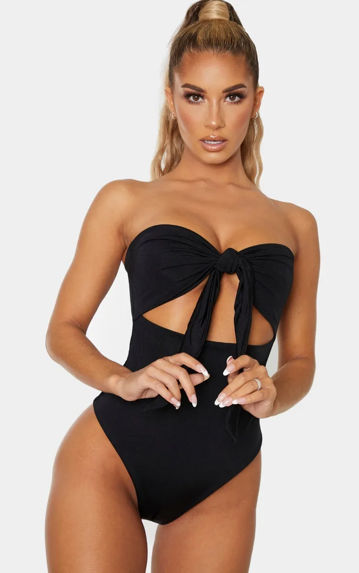 Black Bow Front Cut Out Swimsuit sold by Pretty Little Thing