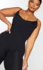 Plus Black Basic Strappy Plunge Jumpsuit sold by Pretty Little Thing