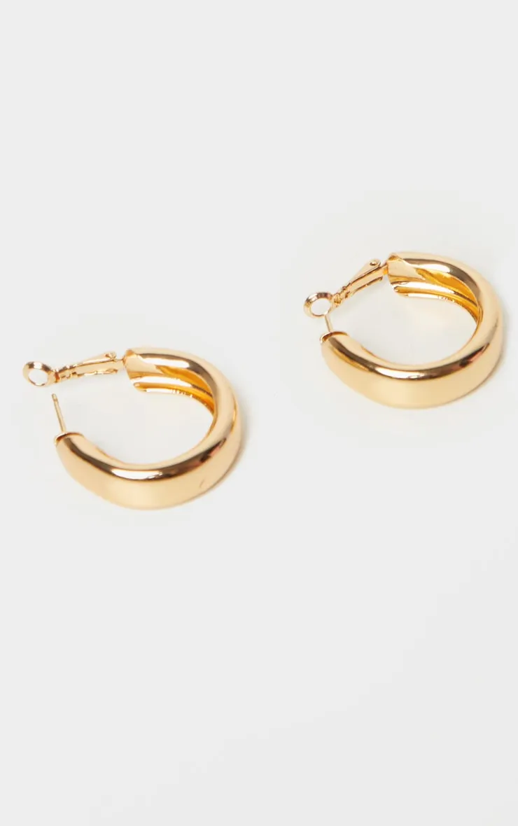 Gold Small Chunky Tubular Hoop Earrings sold by Pretty Little Thing product image thumbnail 2