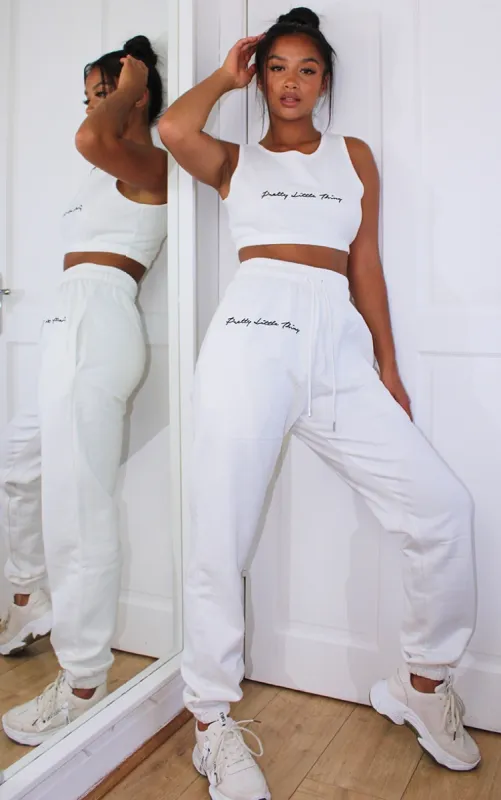 PRETTYLITTLETHING Petite White Embroidered Oversized Joggers sold by Pretty Little Thing