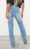 PRETTYLITTLETHING Mid Blue Wash Ripped Long Leg Straight Jeans sold by Pretty Little Thing