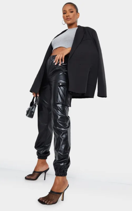 Black Faux Leather Cargo Trousers sold by Pretty Little Thing