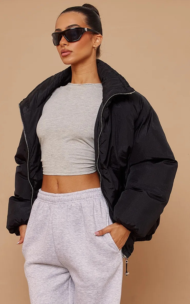 Petite Black Extreme Oversized Puffer Jacket sold by Pretty Little Thing product image thumbnail 4
