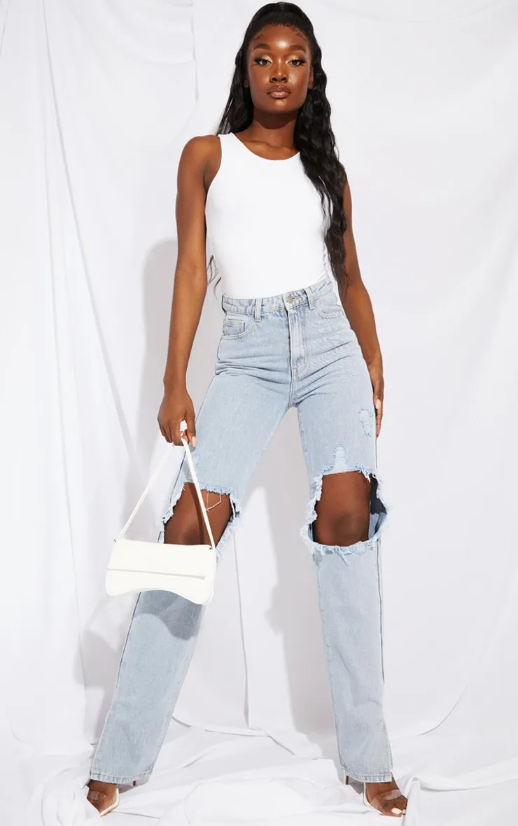 Tall Light Blue Ripped Knee Split Hem Denim Jeans sold by Pretty Little Thing