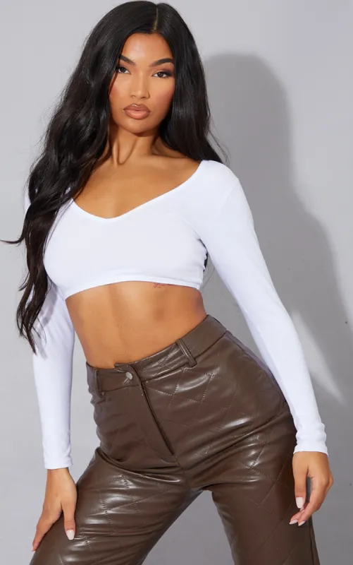 Basic White Cotton Blend Long Sleeve Deep V Crop Top sold by Pretty Little Thing