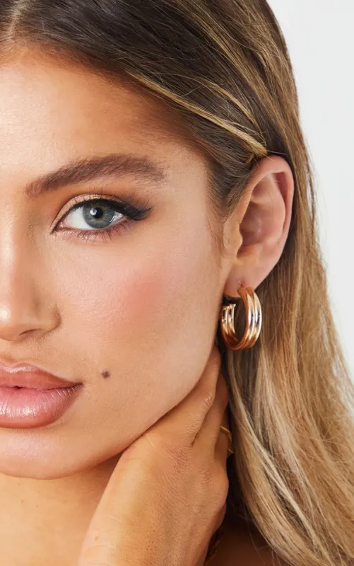 Gold Mini Chunky Double Hoop Earrings sold by Pretty Little Thing