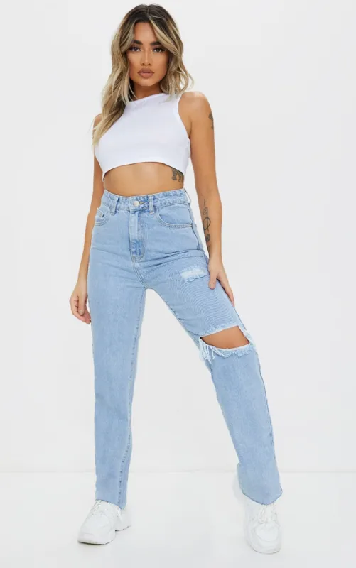 Petite Knee Rip Light Blue Wash Long Leg Straight Jeans sold by Pretty Little Thing