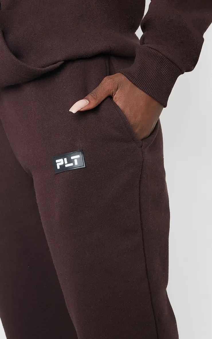 PRETTYLITTLETHING Tall Chocolate Badge Detail Straight Leg Joggers sold by Pretty Little Thing product image thumbnail 4