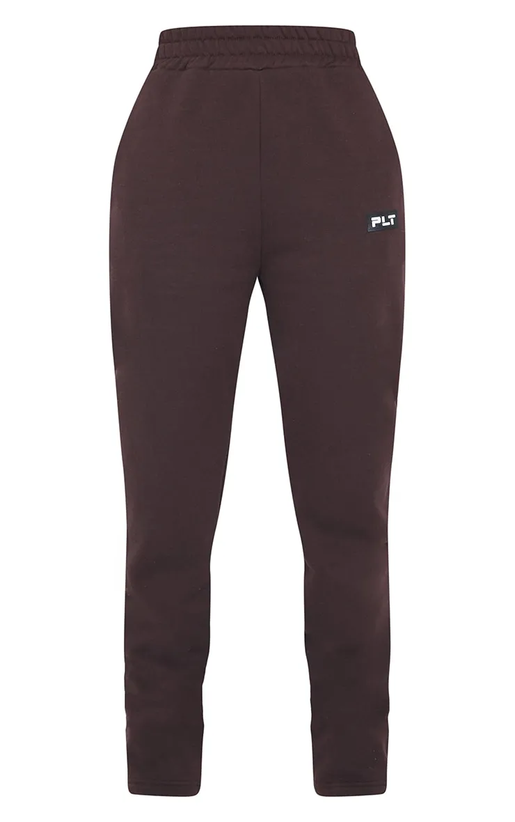 PRETTYLITTLETHING Tall Chocolate Badge Detail Straight Leg Joggers sold by Pretty Little Thing product image thumbnail 5