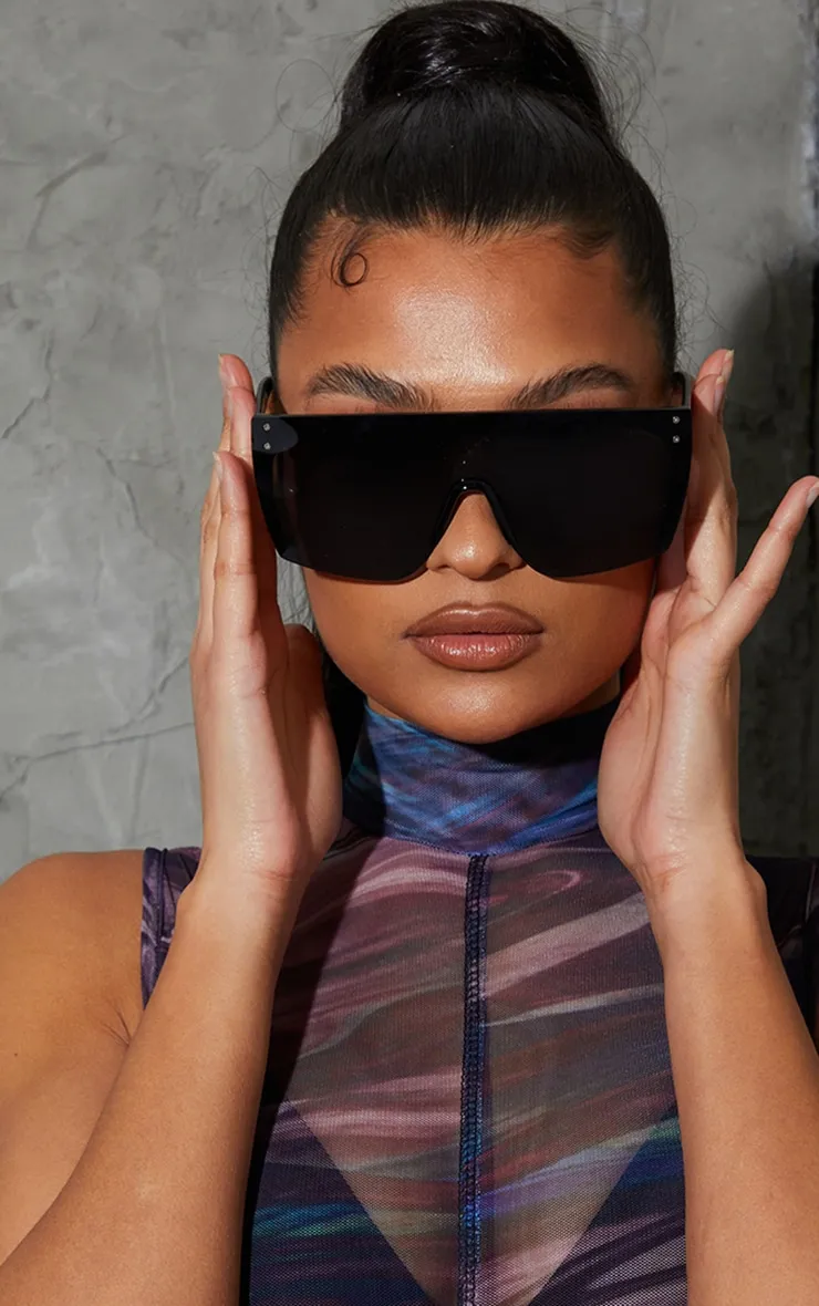 Black Oversized Semi Rimless Visor sold by Pretty Little Thing