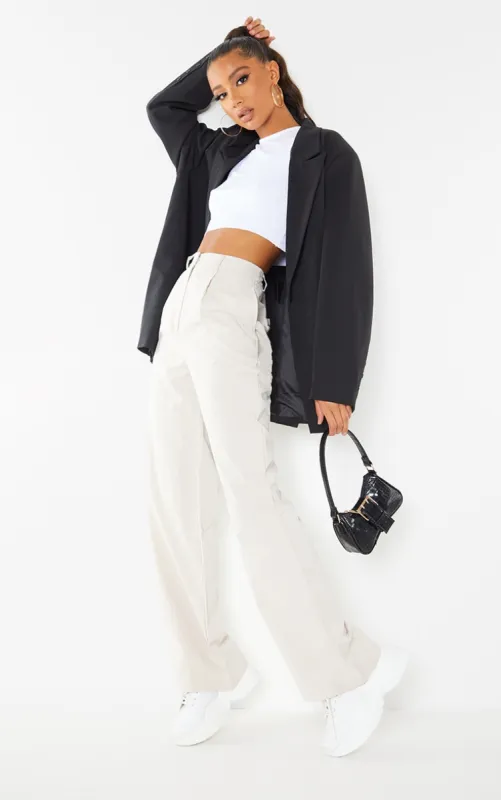 Stone Peach Skin Straight Leg Trousers made by Pretty Little Thing