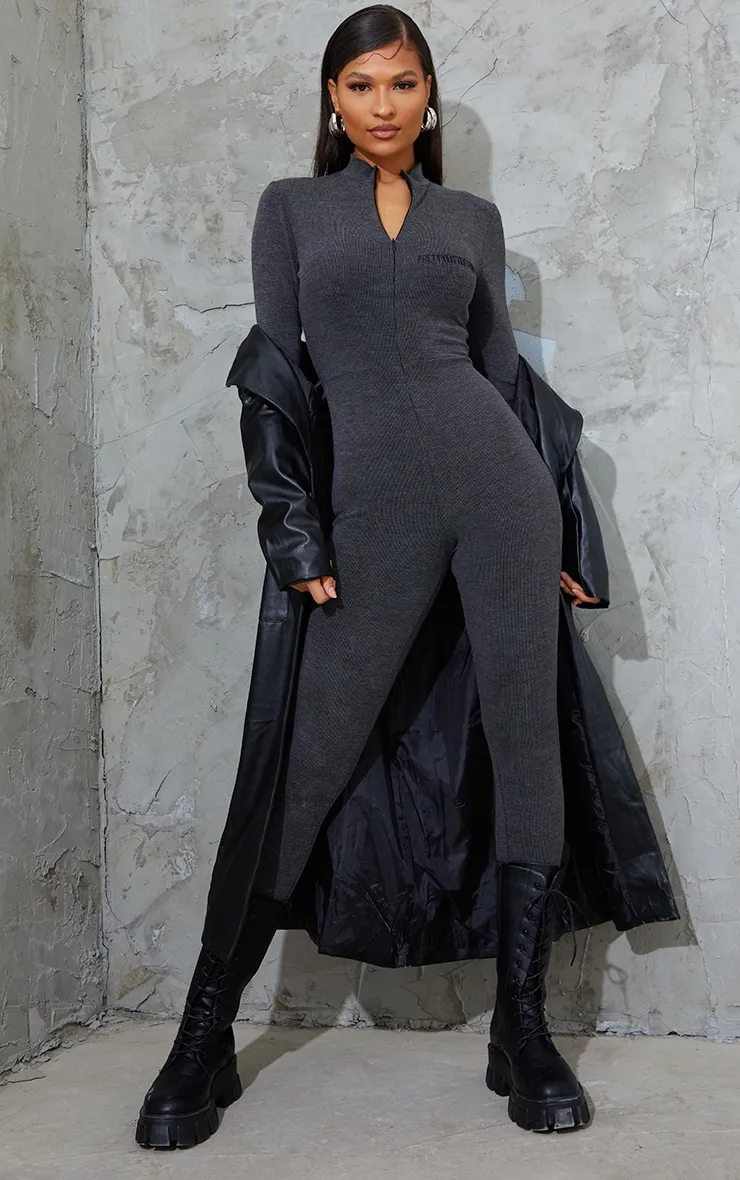 PRETTYLITTLETHING Charcoal Embroidered Rib Zip Front Catsuit sold by Pretty Little Thing