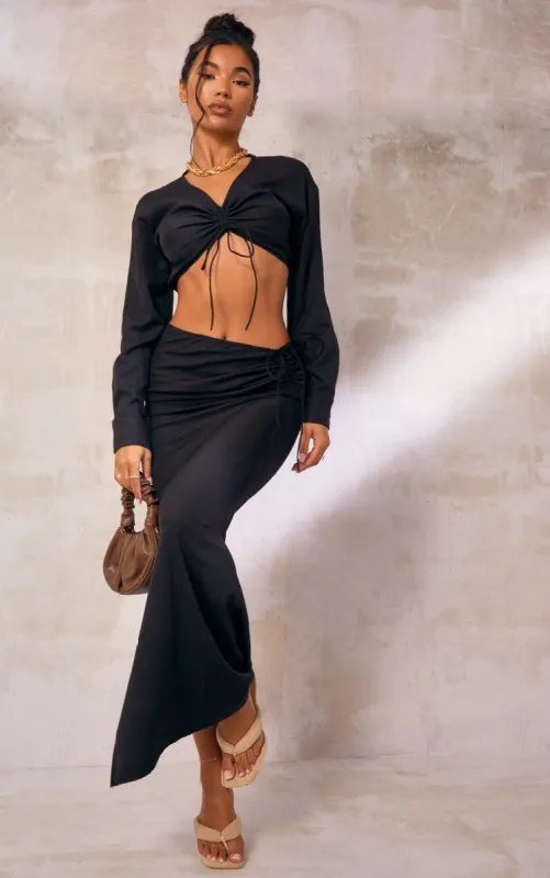 Black Woven Ruched Tie Front Maxi Skirt sold by Pretty Little Thing