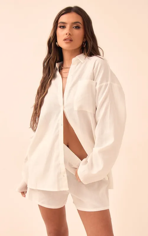 White Woven Balloon Sleeve Oversized Shirt sold by Pretty Little Thing