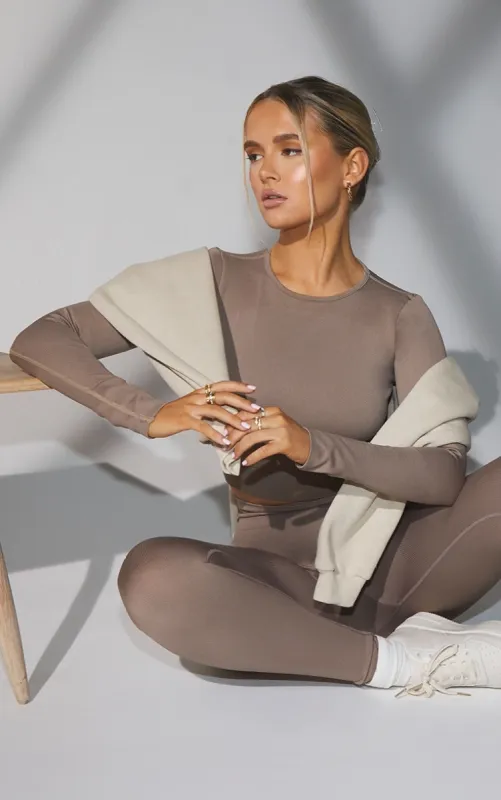 Taupe Seamless Long Sleeve Rib Detail Sports Top sold by Pretty Little Thing