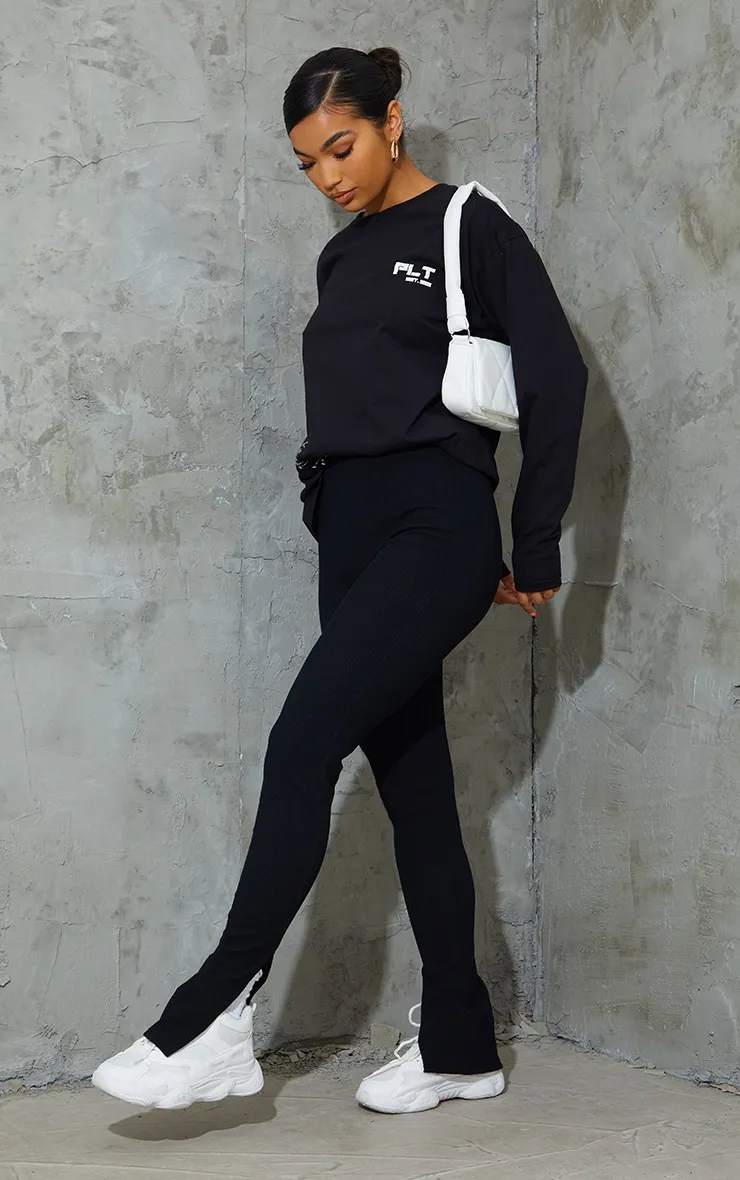 Black Textured Ribbed Split Hem Leggings sold by Pretty Little Thing