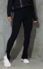 Black Textured Ribbed Split Hem Leggings sold by Pretty Little Thing