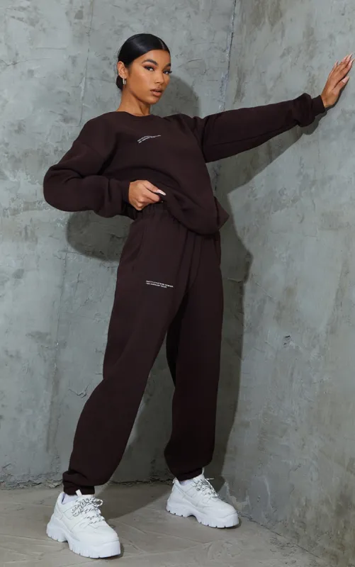 PRETTYLITTLETHING Chocolate Brown Est 2012 Joggers sold by Pretty Little Thing