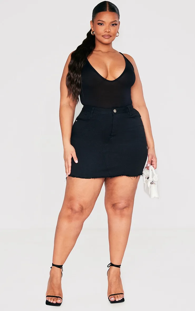 Plus Basic Black Denim Skirt sold by Pretty Little Thing