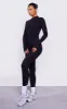 Black Cotton Zip Front Catsuit sold by Pretty Little Thing