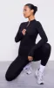 Black Cotton Zip Front Catsuit sold by Pretty Little Thing