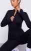 Black Cotton Zip Front Catsuit sold by Pretty Little Thing