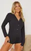 Black Ribbed Button Detail PJ Romper sold by Pretty Little Thing
