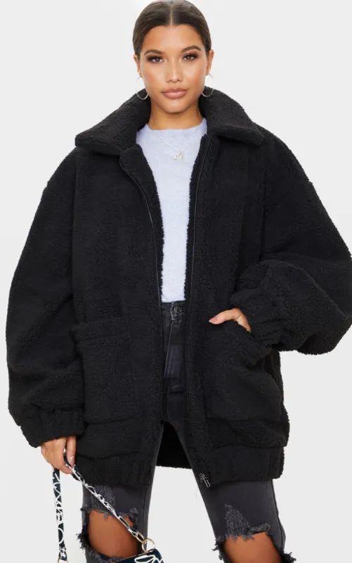 Black Oversized Borg Pocket Front Coat sold by Pretty Little Thing