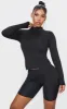 Black Marl Fleece Lined Long Sleeve Gym Top sold by Pretty Little Thing