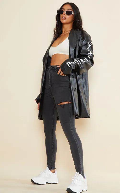 PRETTYLITTLETHING Petite Washed Black Thigh Rip Raw Hem 5 Pocket Skinny Jeans sold by Pretty Little Thing