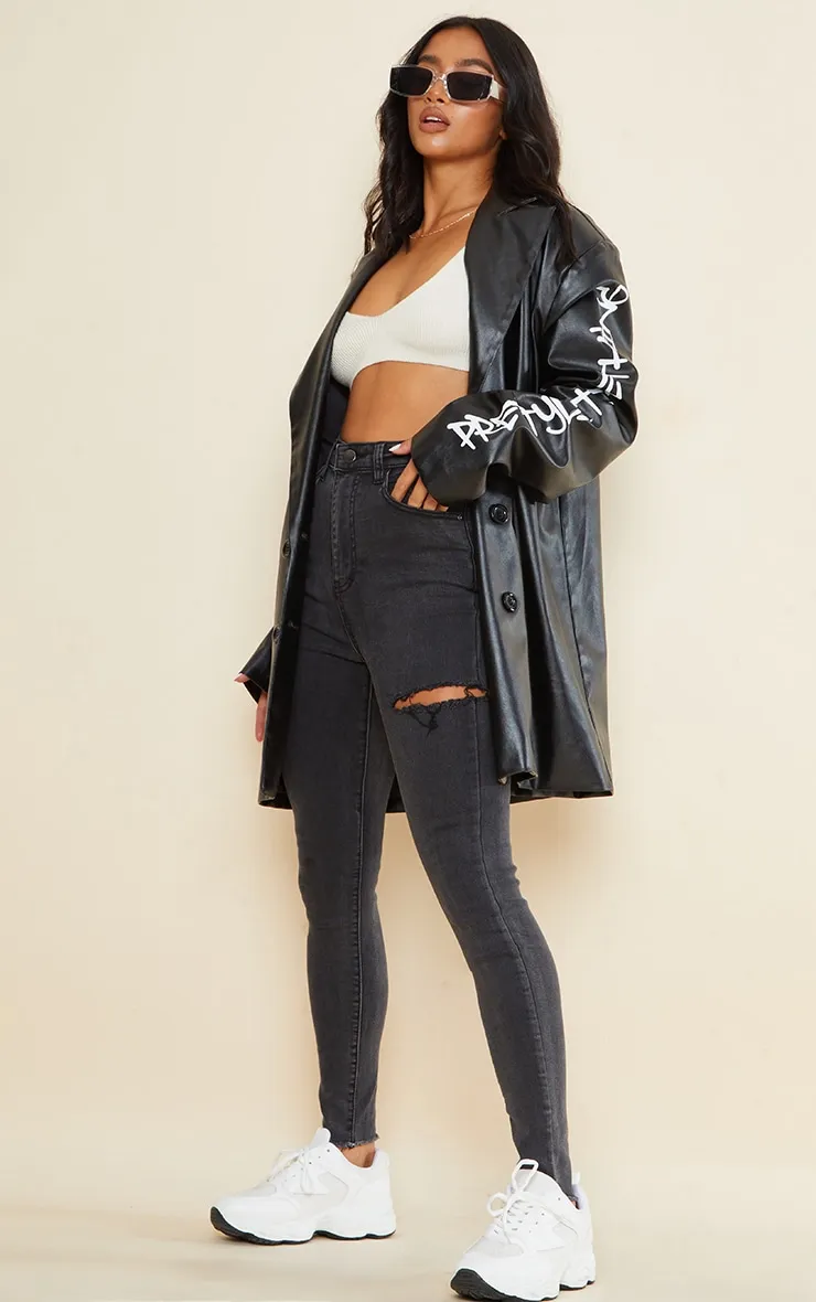 PRETTYLITTLETHING Petite Washed Black Thigh Rip Raw Hem 5 Pocket Skinny Jeans sold by Pretty Little Thing