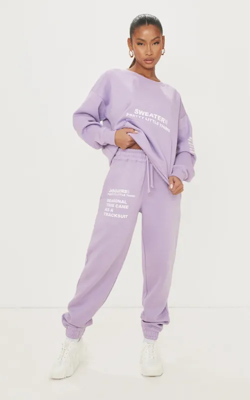 PRETTYLITTLETHING Purple Slogan Print Joggers made by Pretty Little Thing