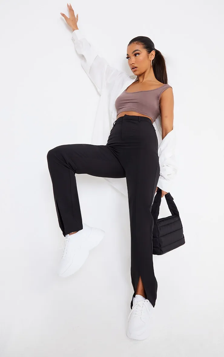 Black Woven Straight Leg Split Hem Trousers sold by Pretty Little Thing