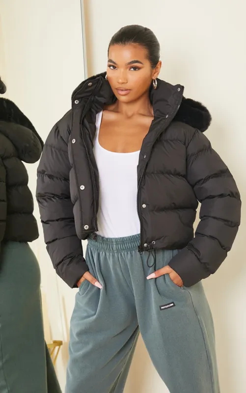 Black Faux Fur Hooded Puffer Coat sold by Pretty Little Thing