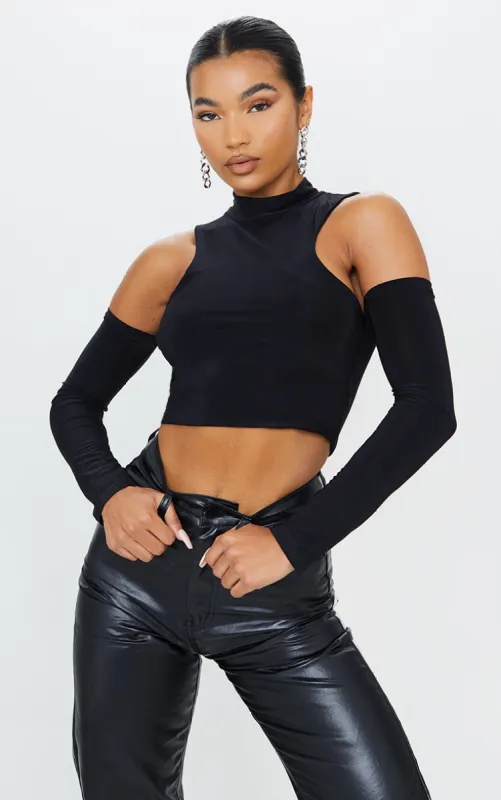 Black Slinky Cold Shoulder Long Sleeve Crop Top sold by Pretty Little Thing