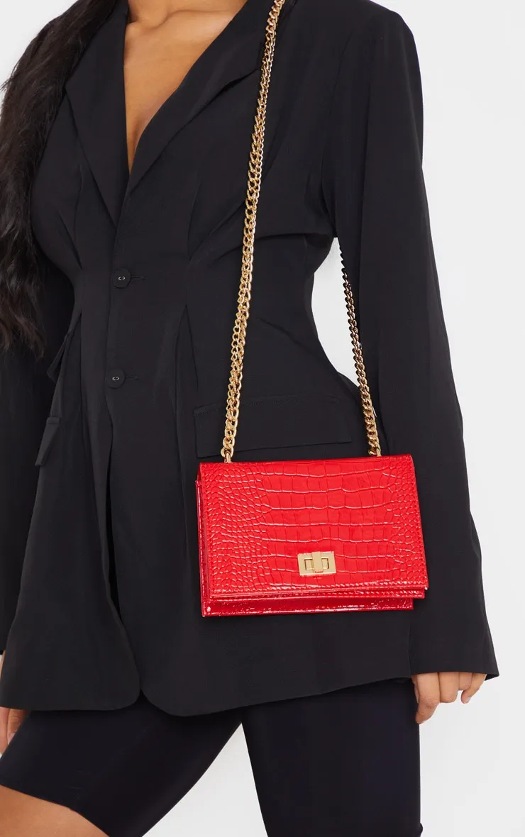 Red Patent Croc Flap Square Cross Body Bag sold by Pretty Little Thing