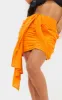 Orange Ruched Drape Front Linen Look Mini Skirt sold by Pretty Little Thing