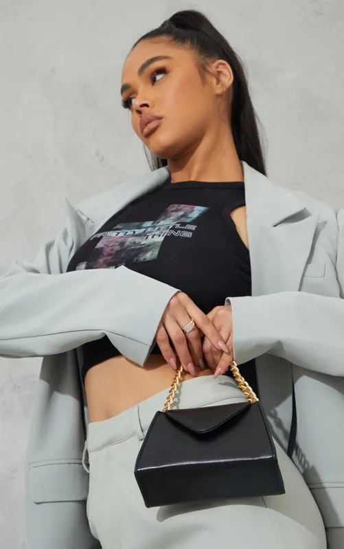 Black Mini Envelope Gold Chain Grab Bag sold by Pretty Little Thing