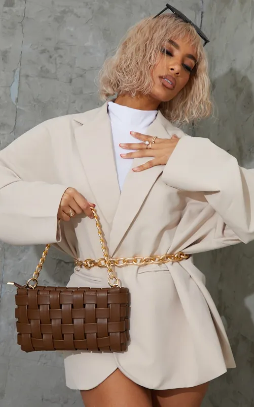 Chocolate Oversized Weave With Gold Chain Shoulder Bag sold by Pretty Little Thing
