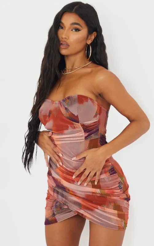 Orange Abstract Print Bandeau Ruched Bodycon Dress sold by Pretty Little Thing