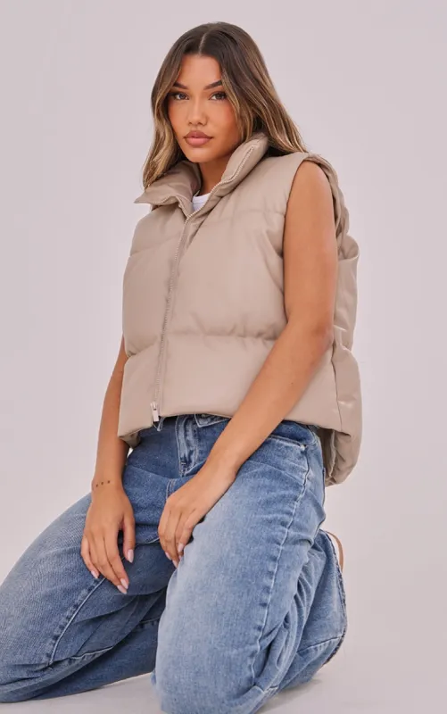 Truffle Faux Leather Drop Hem Gilet sold by Pretty Little Thing