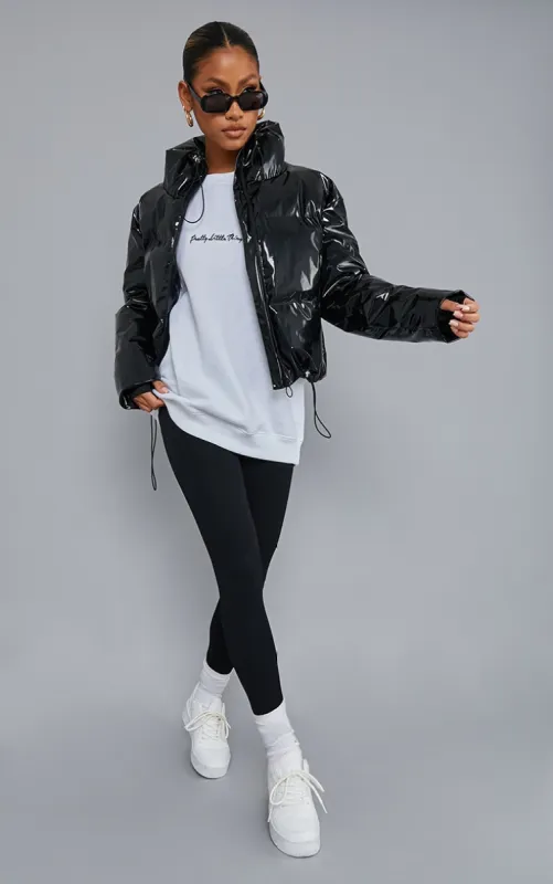 Black Vinyl Funnel Neck Panelled Puffer sold by Pretty Little Thing