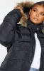 Plus Black Quilted Mara Faux Fur Hooded Puffer Jacket sold by Pretty Little Thing