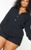 Plus Black Pocket Detail Boiler Playsuit sold by Pretty Little Thing