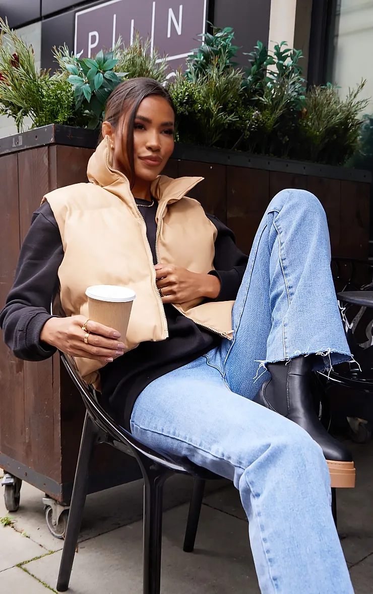 Caramel Faux Leather Drop Hem Gilet sold by Pretty Little Thing