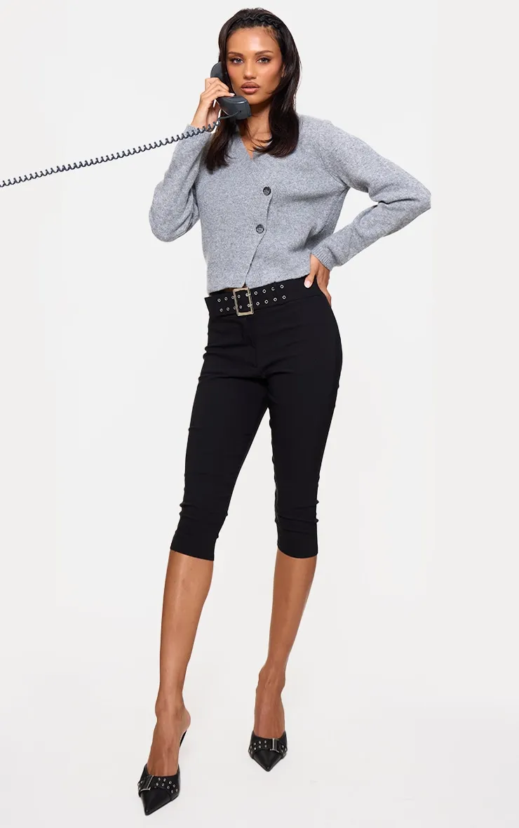 Black Stretch Woven Low Rise Belted Capri Pants sold by Pretty Little Thing