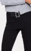 Black Stretch Woven Low Rise Belted Capri Pants sold by Pretty Little Thing